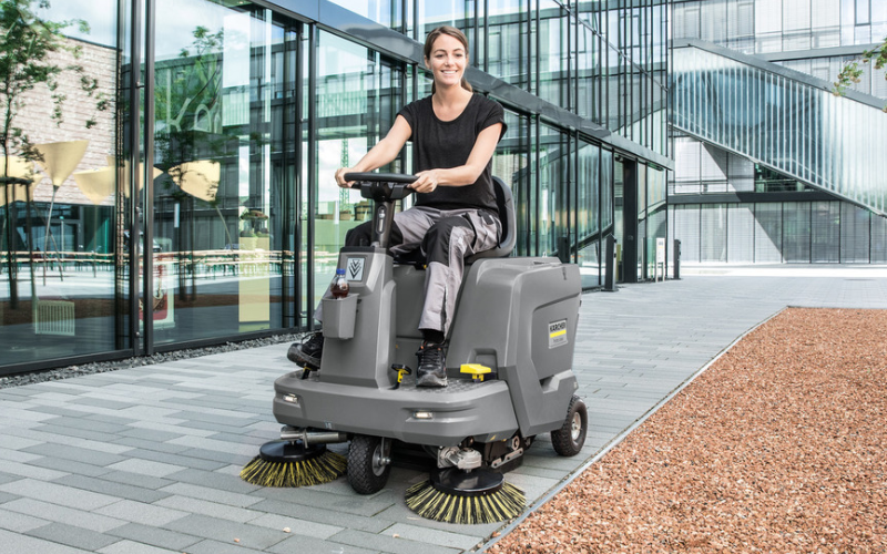 ride on floor sweeper in use